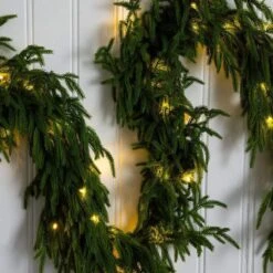 9 Ft. Pre-Lit Artificial Real Touch Norfolk Island Pine Garland With 50-Warm White LED Lights And Natural Look -Holiday Glow Store nearly natural christmas garland w1394 44 1000