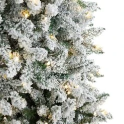 9 Ft. Pre-Lit LED Slim Flocked Montreal Fir Artificial Christmas Tree With 600 Warm White Lights 19 9 Ft. Pre-Lit LED Slim Flocked Montreal Fir Artificial Christmas Tree With 600 Warm White Lights -Holiday Glow Store nearly natural pre lit christmas trees t3313 1f 1000