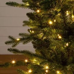 4.5 Ft. Pre-Lit Artificial Christmas Tree In Decorative Planter With 60-Clear LED Lights -Holiday Glow Store nearly natural pre lit christmas trees t5390 44 1000