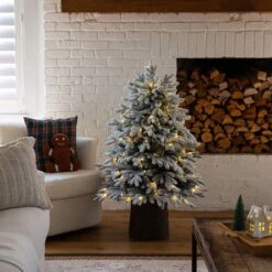 4 Ft. Pre-Lit Artificial Flocked Christmas Tree With 100-Warm White LED Lights In Decorative Trunk Planter -Holiday Glow Store nearly natural pre lit christmas trees t5405 31 1000