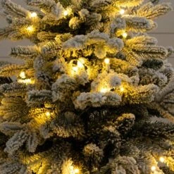 4 Ft. Pre-Lit Artificial Flocked Christmas Tree With 100-Warm White LED Lights In Decorative Trunk Planter -Holiday Glow Store nearly natural pre lit christmas trees t5405 fa 1000